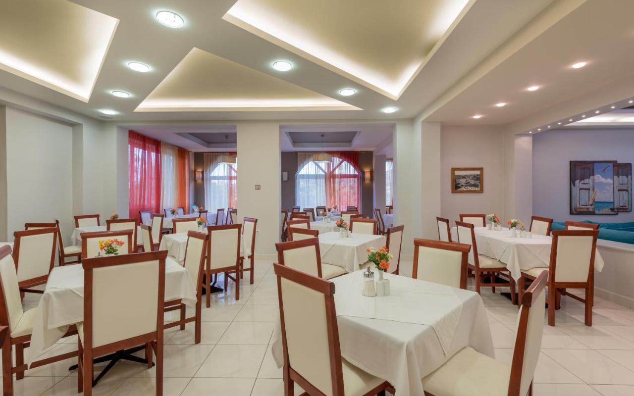 Denny'S Inn Kalamaki  Bagian luar foto