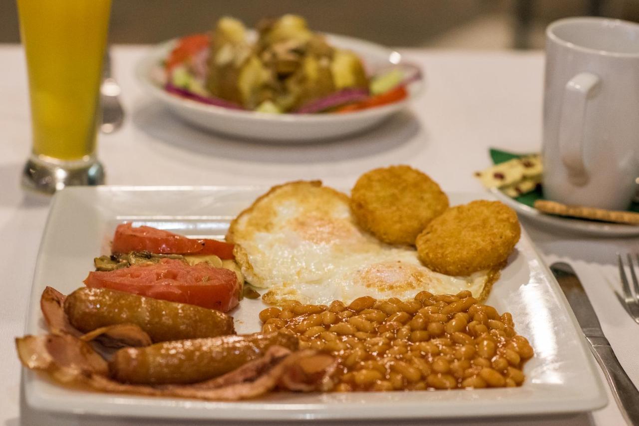 Denny'S Inn Kalamaki  Bagian luar foto